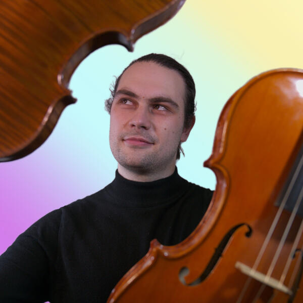 profile pic: Will holding a violin and viola